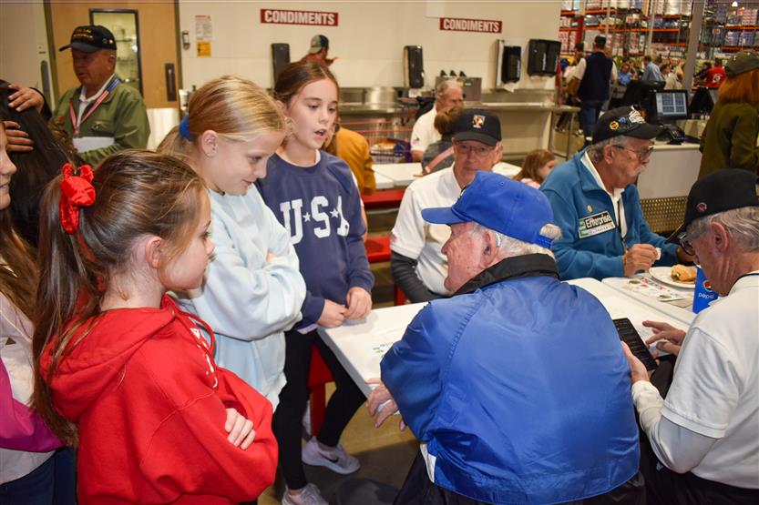 Students visit veterans